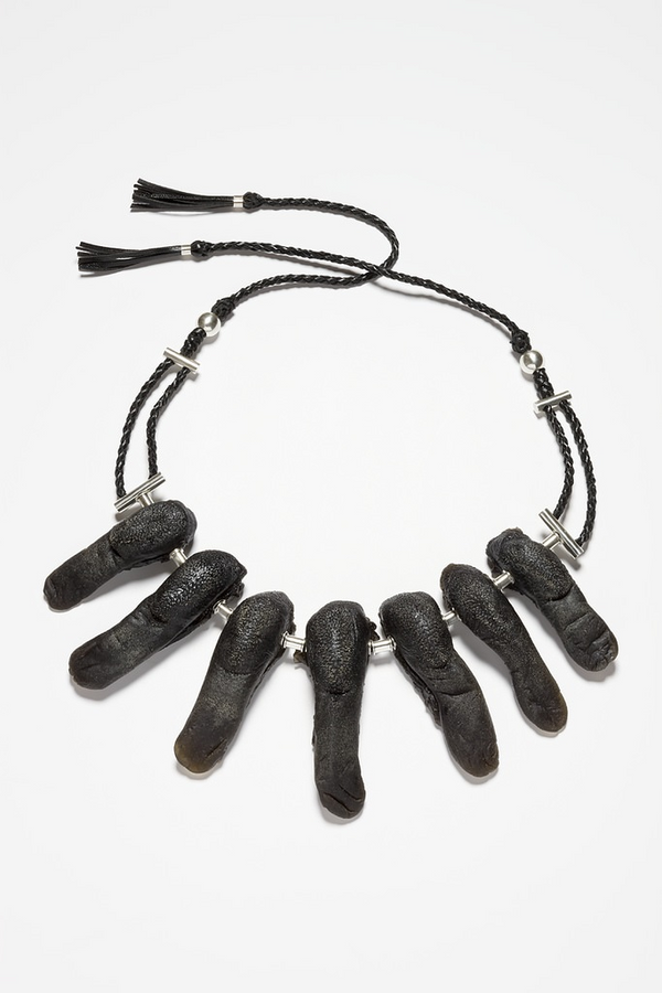 sculpture of necklace of tongues