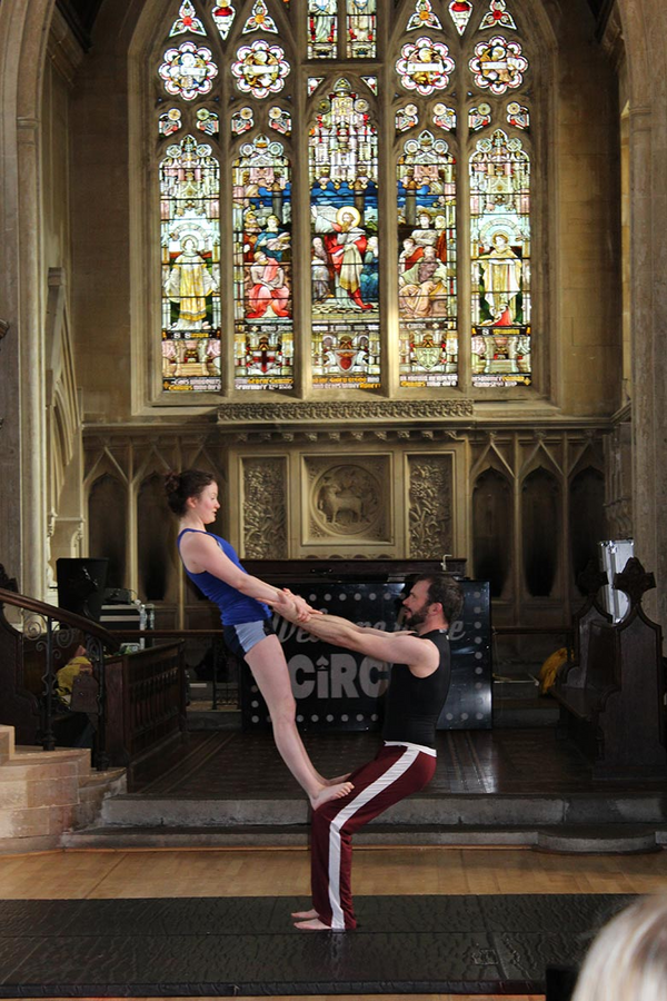 acrobat performers in a church
