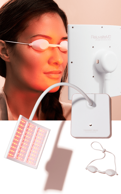 Woman wearing protective goggles while using RejuvaliteMD red-light treatment
