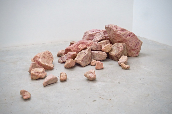 installation of pink rocks scattered on the floor