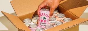 Can of Cherry Vanilla being pulled from a box full of cans