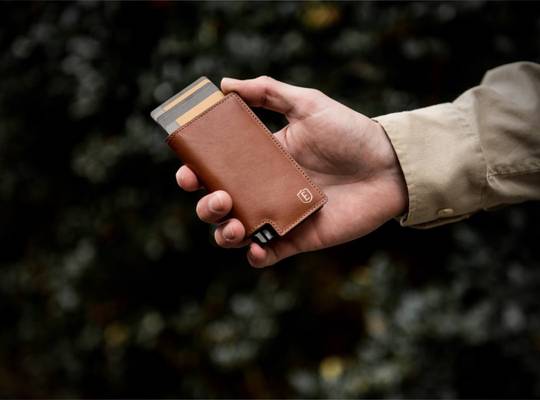 Person holding Premium leather wallet