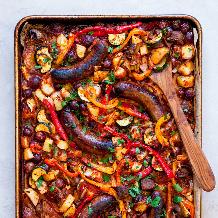 Sheet-pan sausage & veggies made with Sonoma Gourmet's roasted garlic sauce and sauteed garlic olive oil