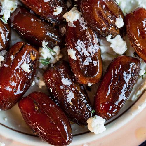 Sautéed dates with goat cheese & olive oil made with Sonoma Gourmet's orange rosemary olive oil