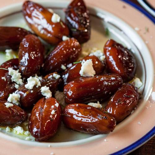 Sautéed dates with goat cheese & olive oil made with Sonoma Gourmet's orange rosemary olive oil