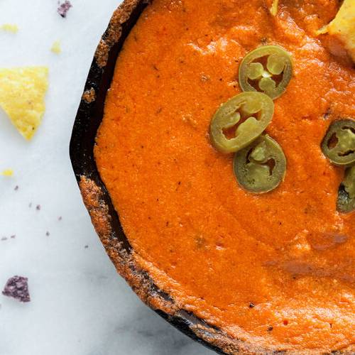 Spicy tomato queso dip made with Sonoma Gourmet's vodka cream sauce