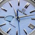 Grand Seiko SBGA407 watch with blue snowflake dial and Spring Drive 9R65 movement. 