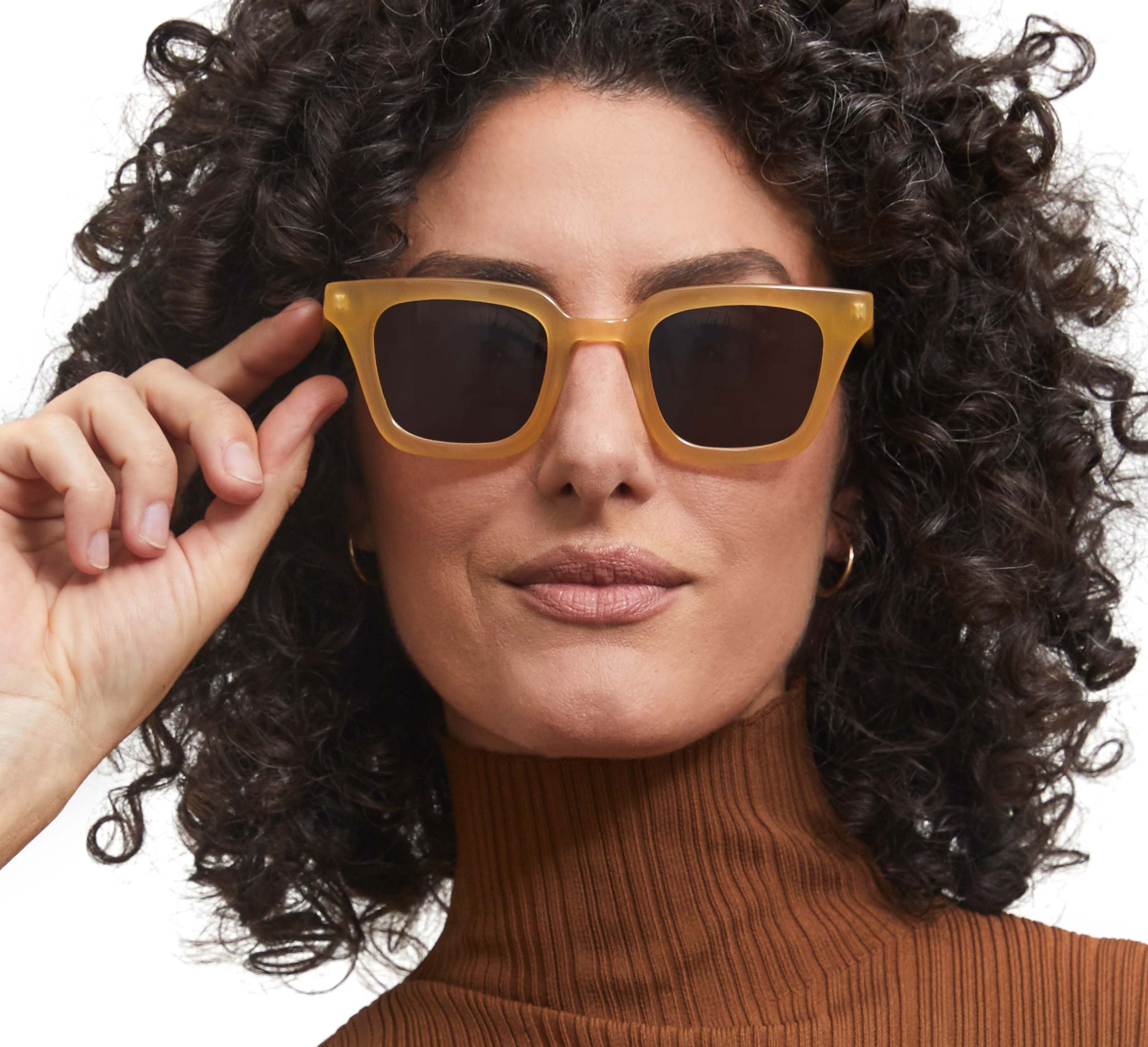 Photo of a man or woman wearing Ysée Sun Rosé Sun Glasses by French Kiwis