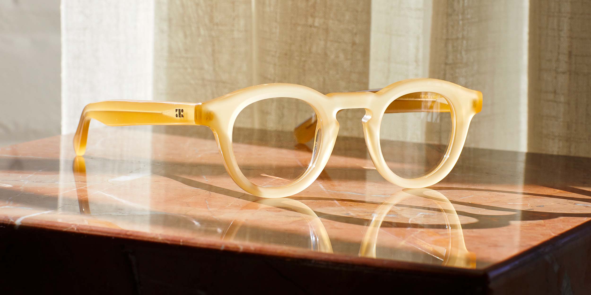 Photo Details of Jude Honey Reading Glasses in a room