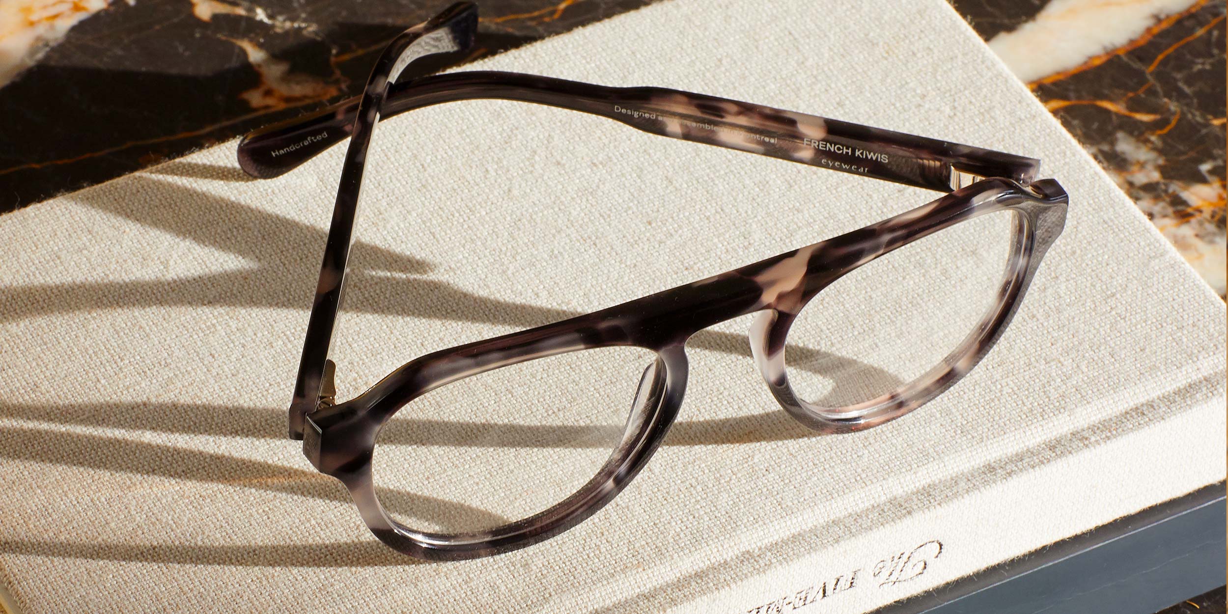 Photo Details of Romain Grey Marble Reading Glasses in a room