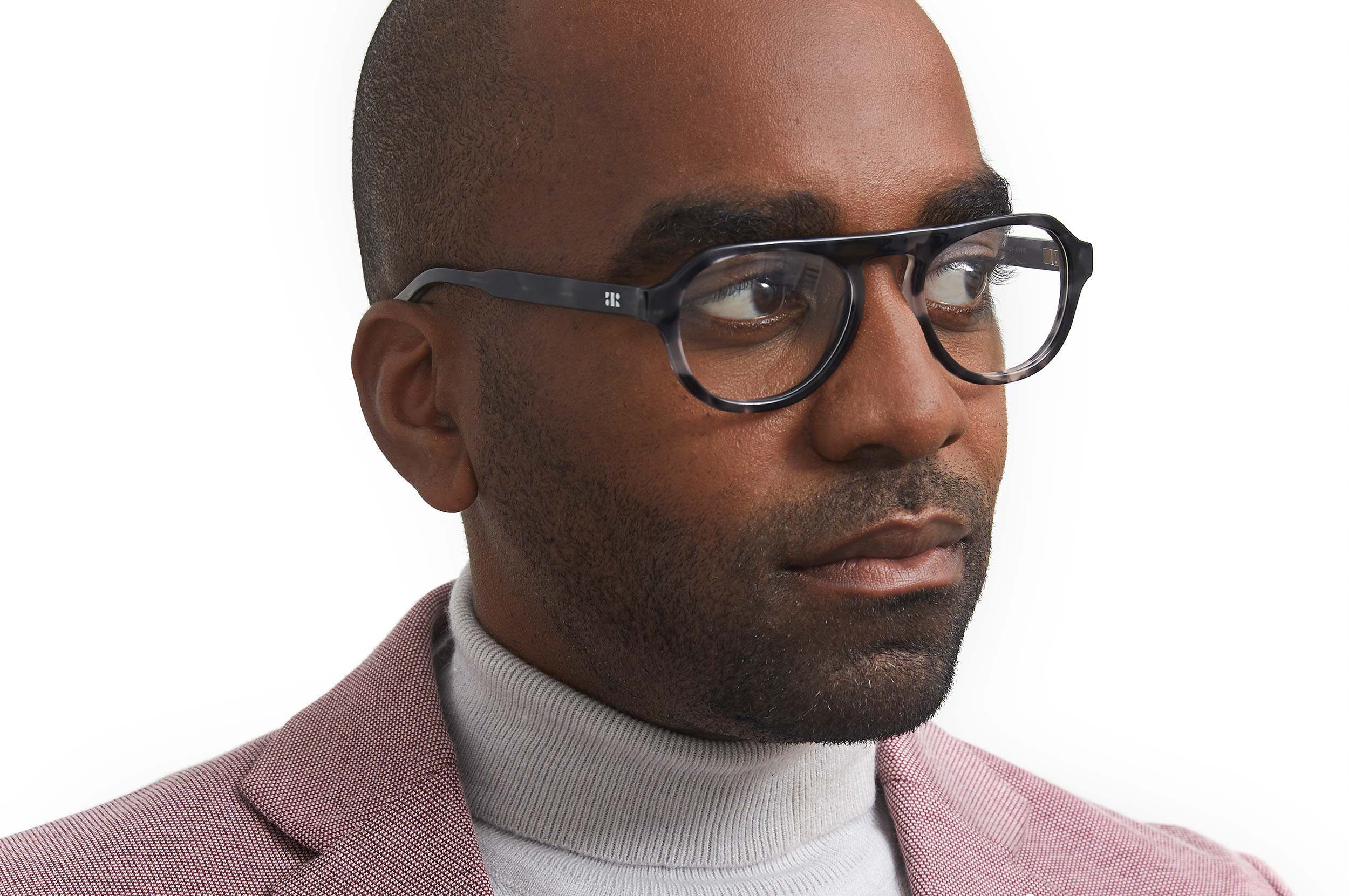 Photo of a man or woman wearing Romain Grey Marble Reading Glasses by French Kiwis