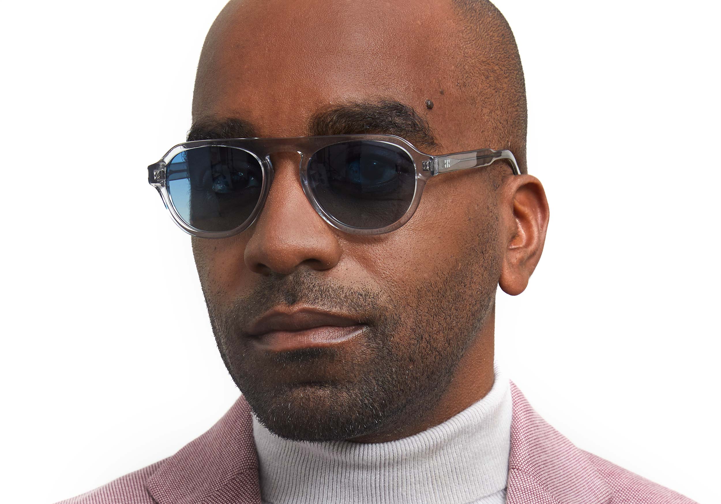 Photo of a man or woman wearing Romain Sun Cobalt Sun Glasses