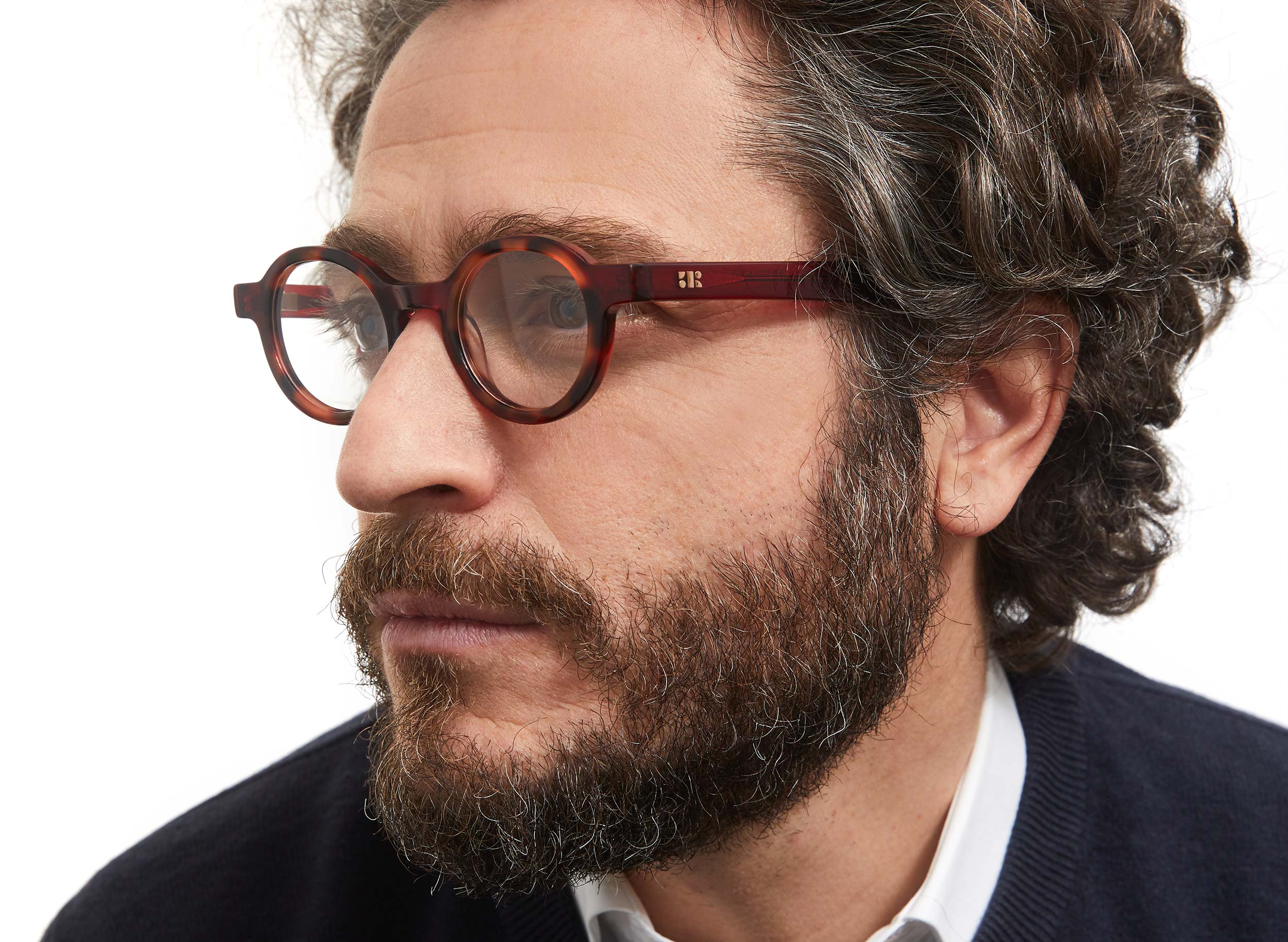 Photo of a man or woman wearing Loïs Black & Grey Marble Reading Glasses by French Kiwis