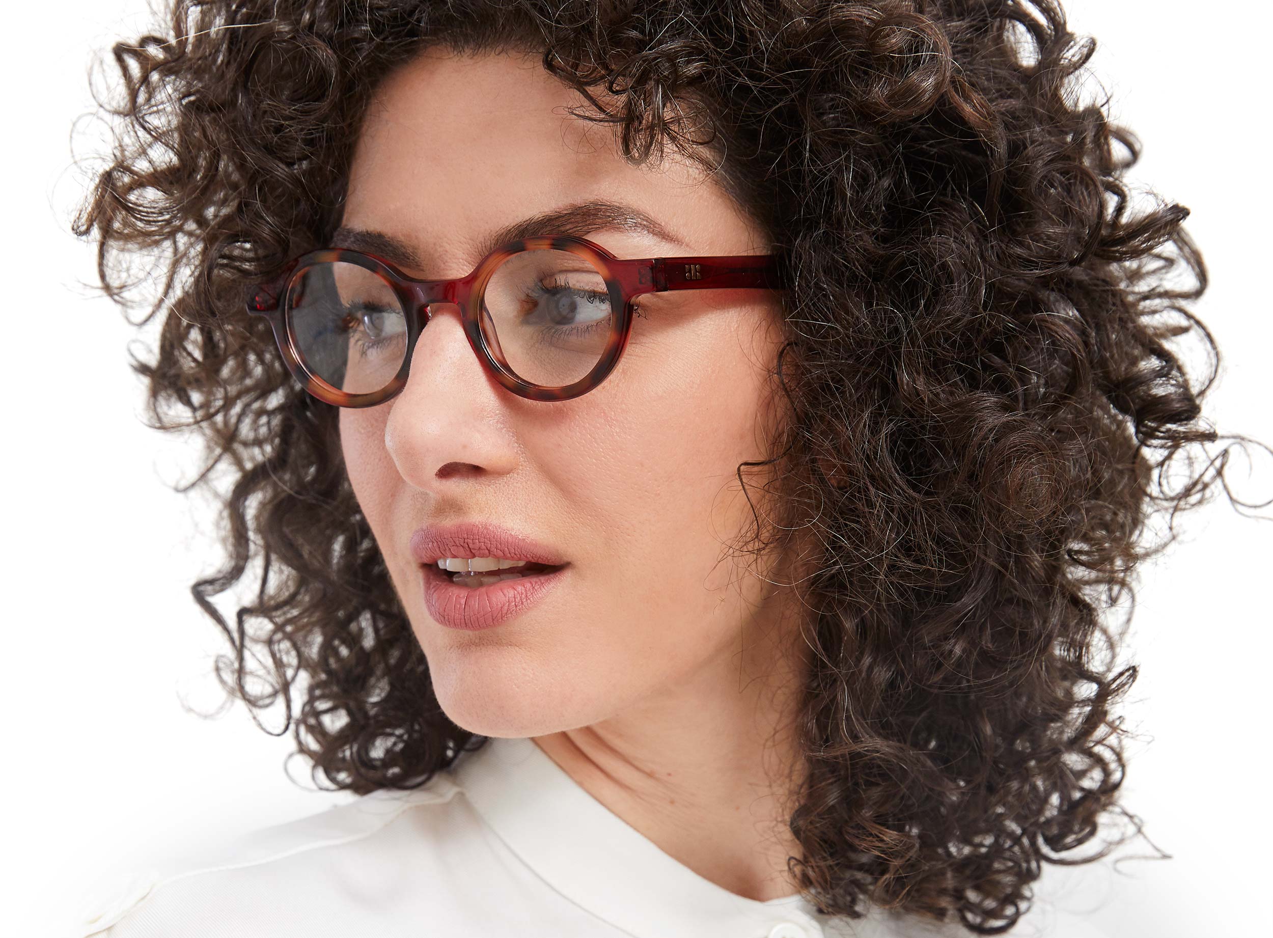 Photo of a man or woman wearing Loïs Mauve & Grey Tortoise Reading Glasses