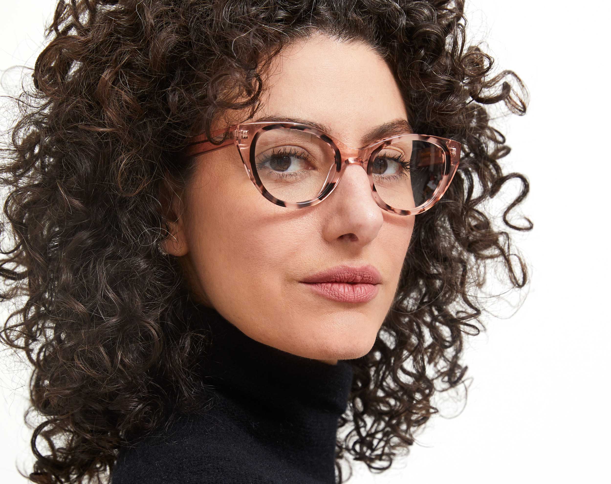 Photo of a man or woman wearing Colette Clear Taupe & Grey Marble Reading Glasses by French Kiwis