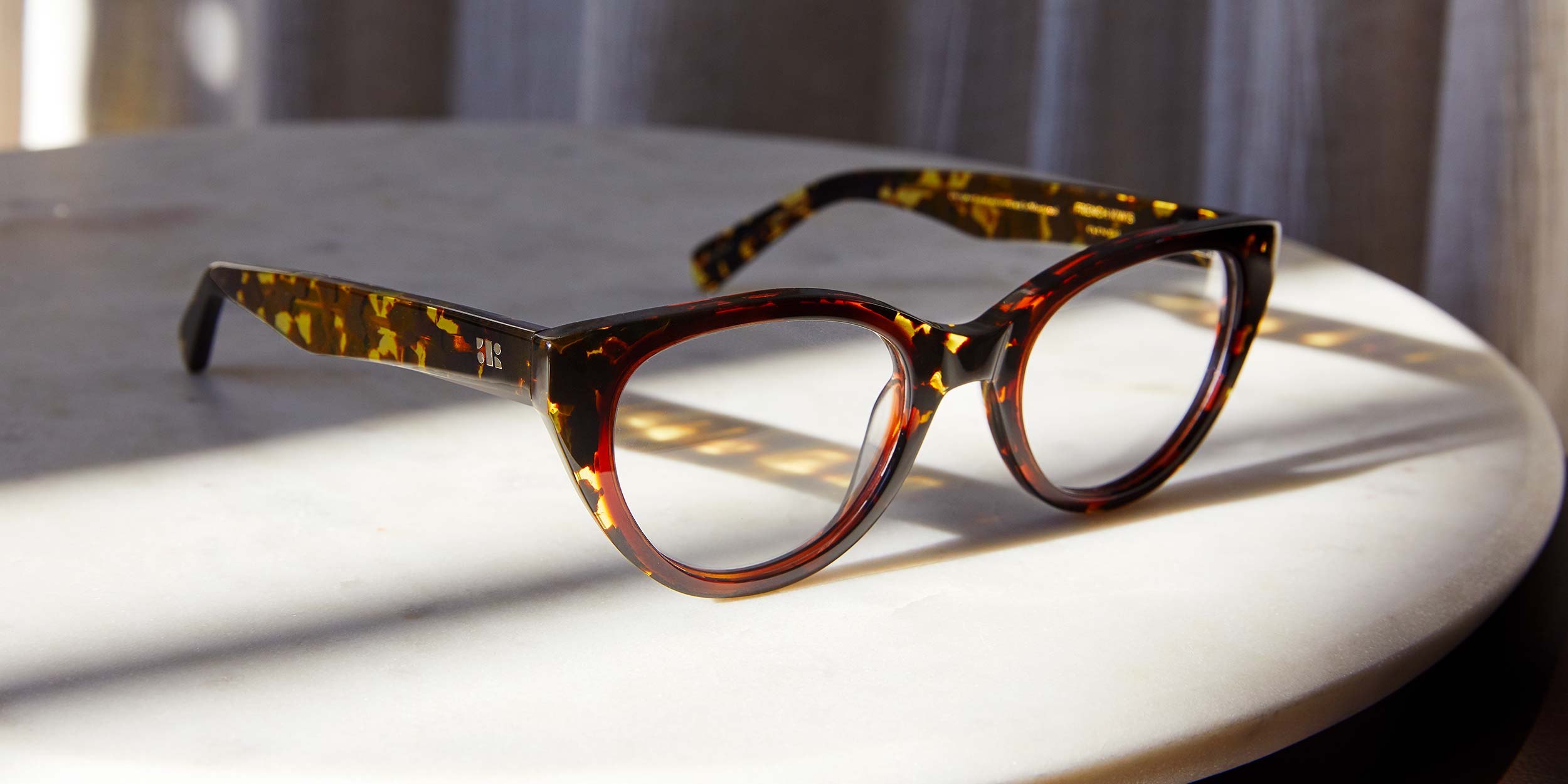 Photo Details of Colette Nude & Tortoise Reading Glasses in a room