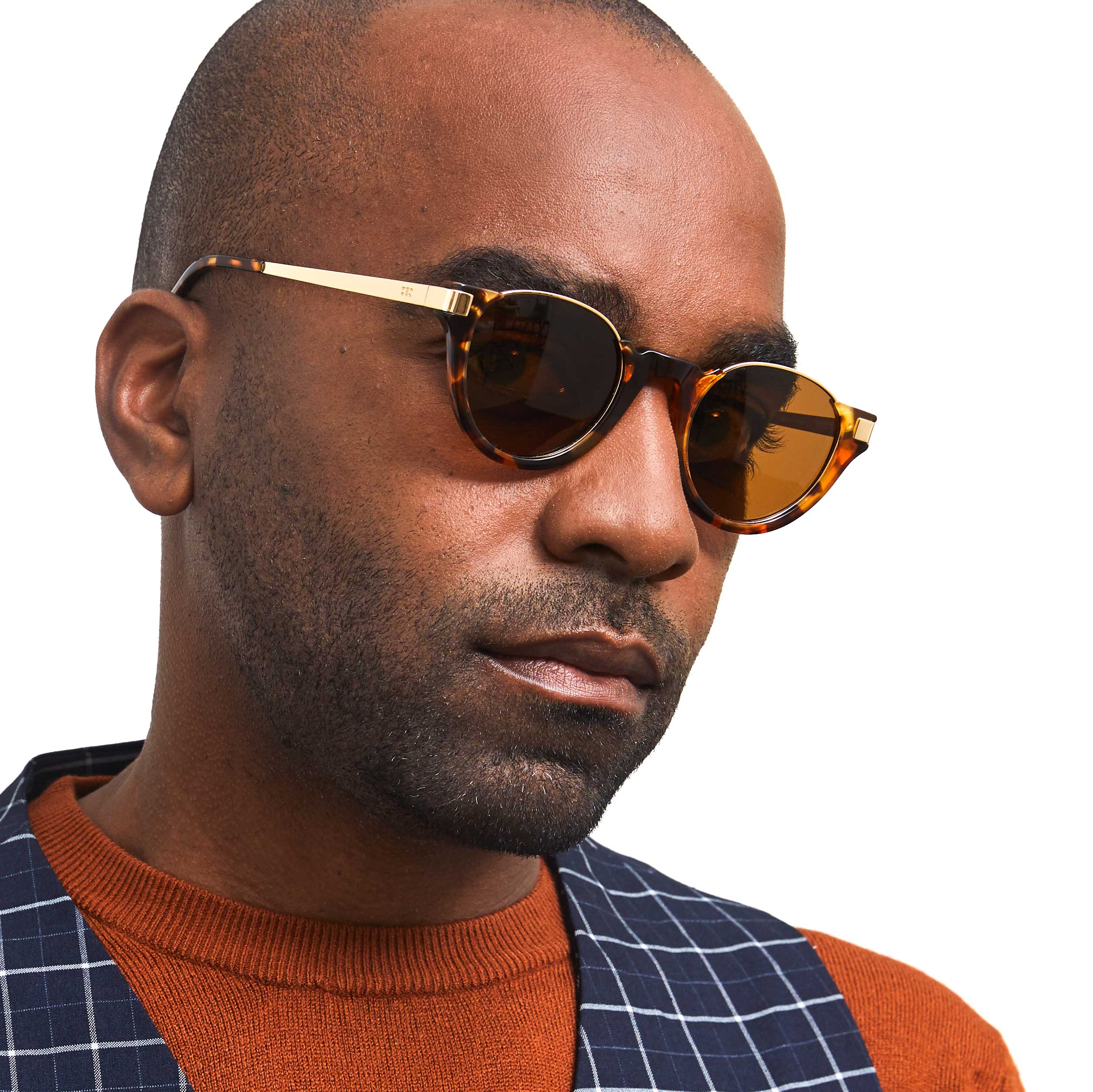 Photo of a man or woman wearing Charlie Sun Tortoise & Gold Sun Glasses