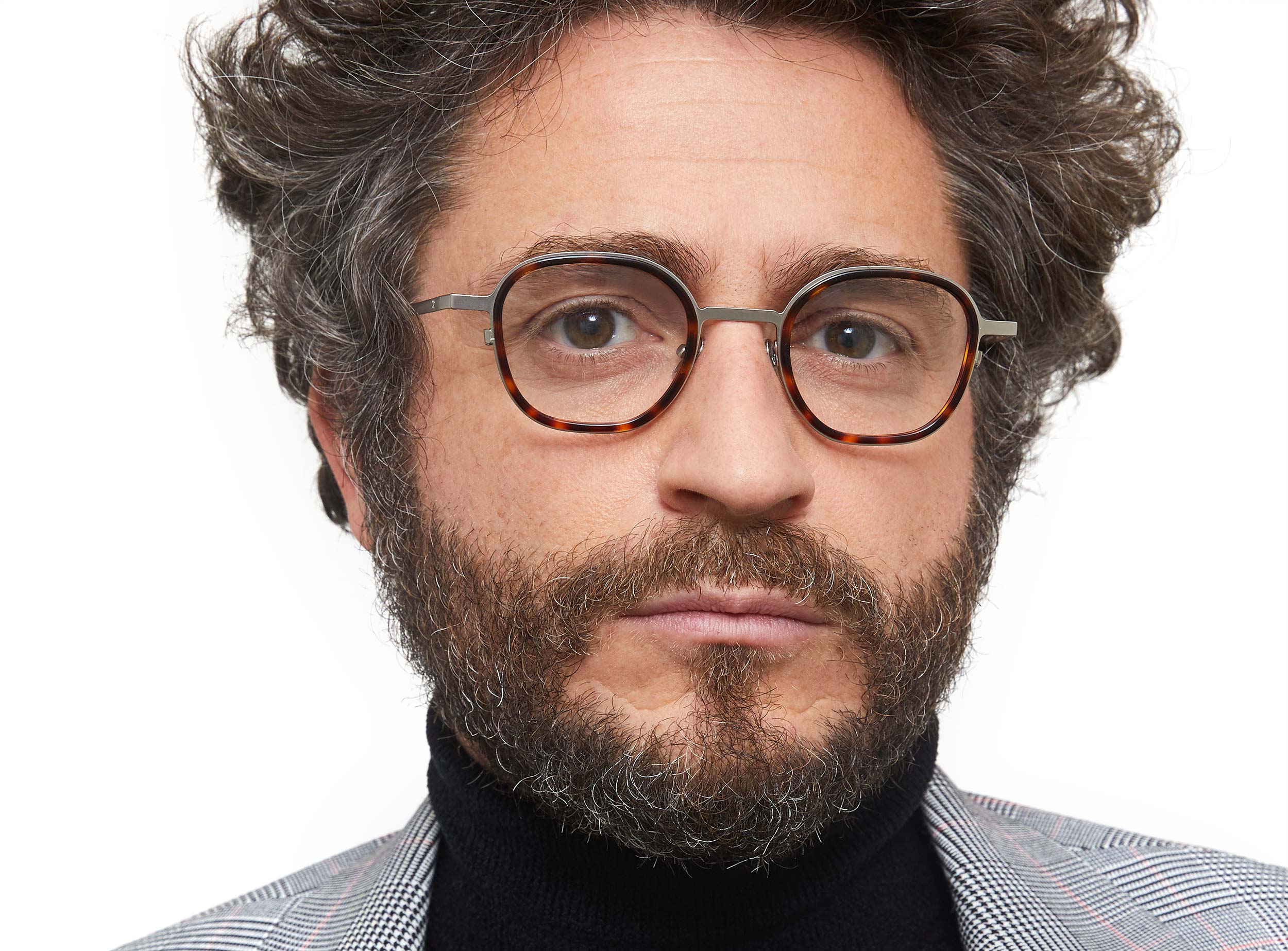 Photo of a man or woman wearing Thierry Tortoise & Mat Silver Reading Glasses