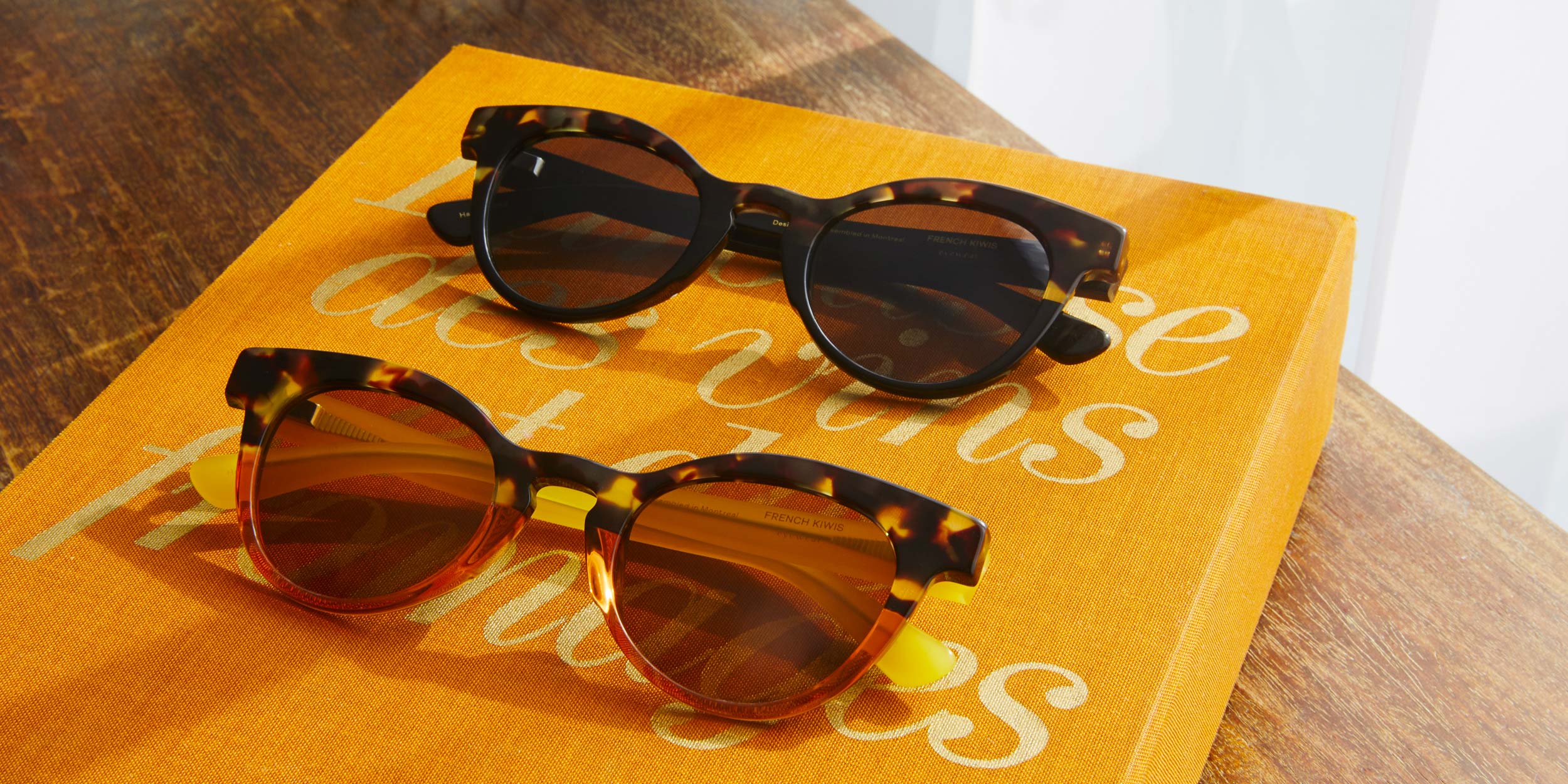 Photo Details of Céline Sun Cyan & Light Tortoise Sun Glasses in a room
