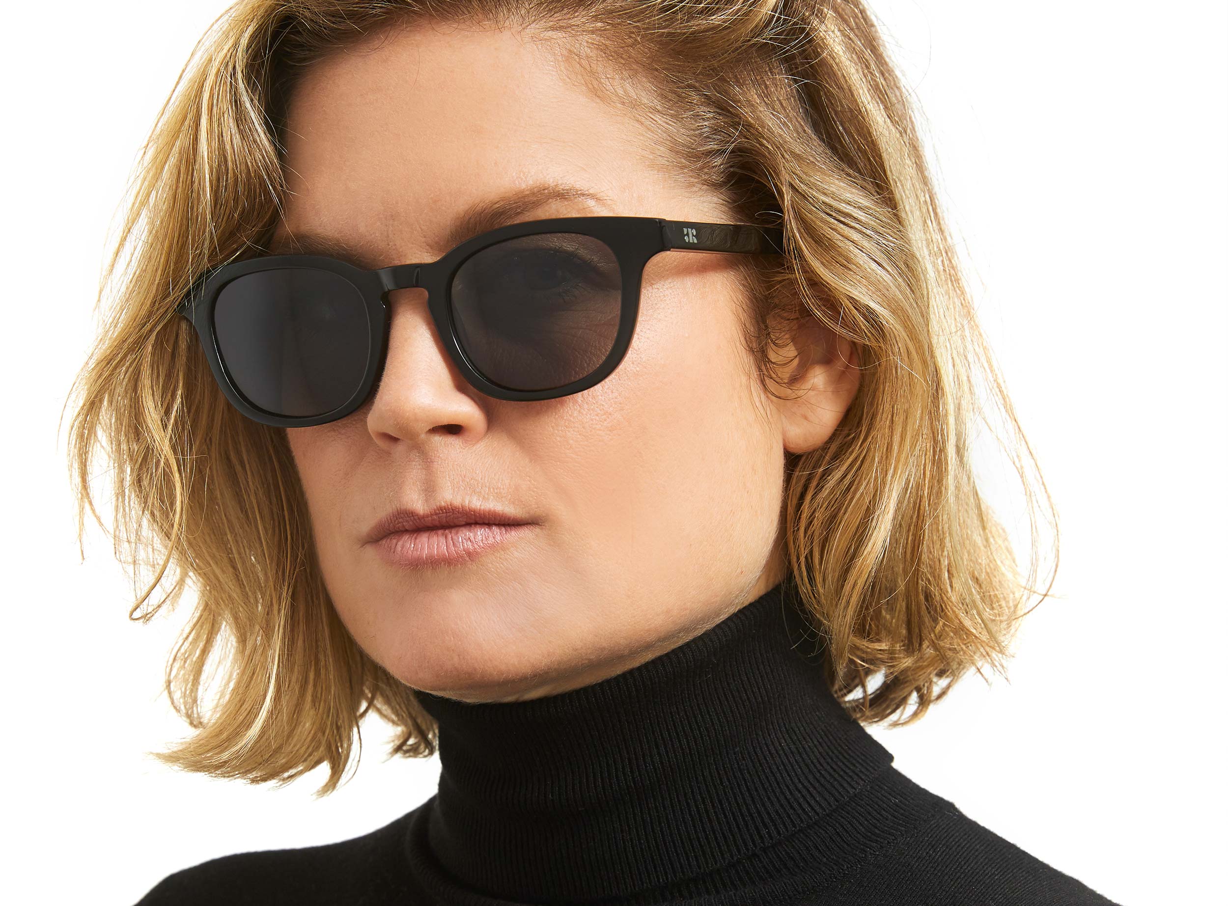 Photo of a man or woman wearing Sinclair Sun Black Sun Glasses by French Kiwis