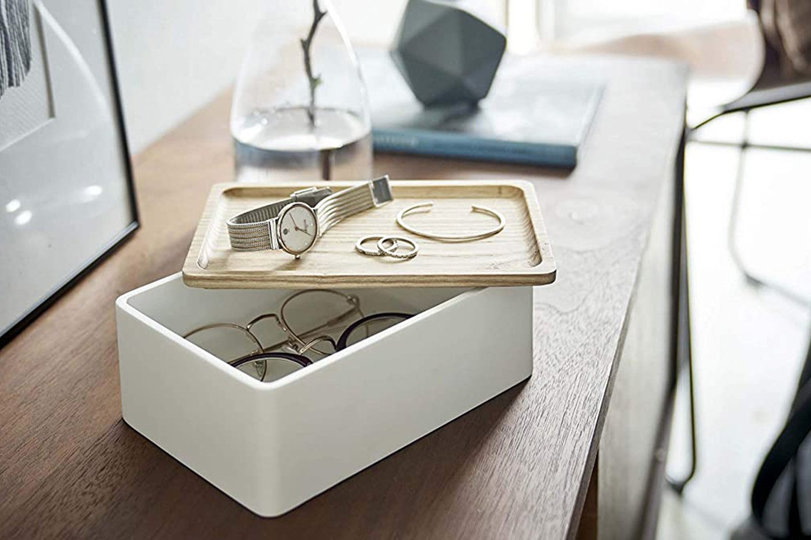 Aerial view of Yamazaki Home Rin Accessory Box holding a watch and two glasses inside. 