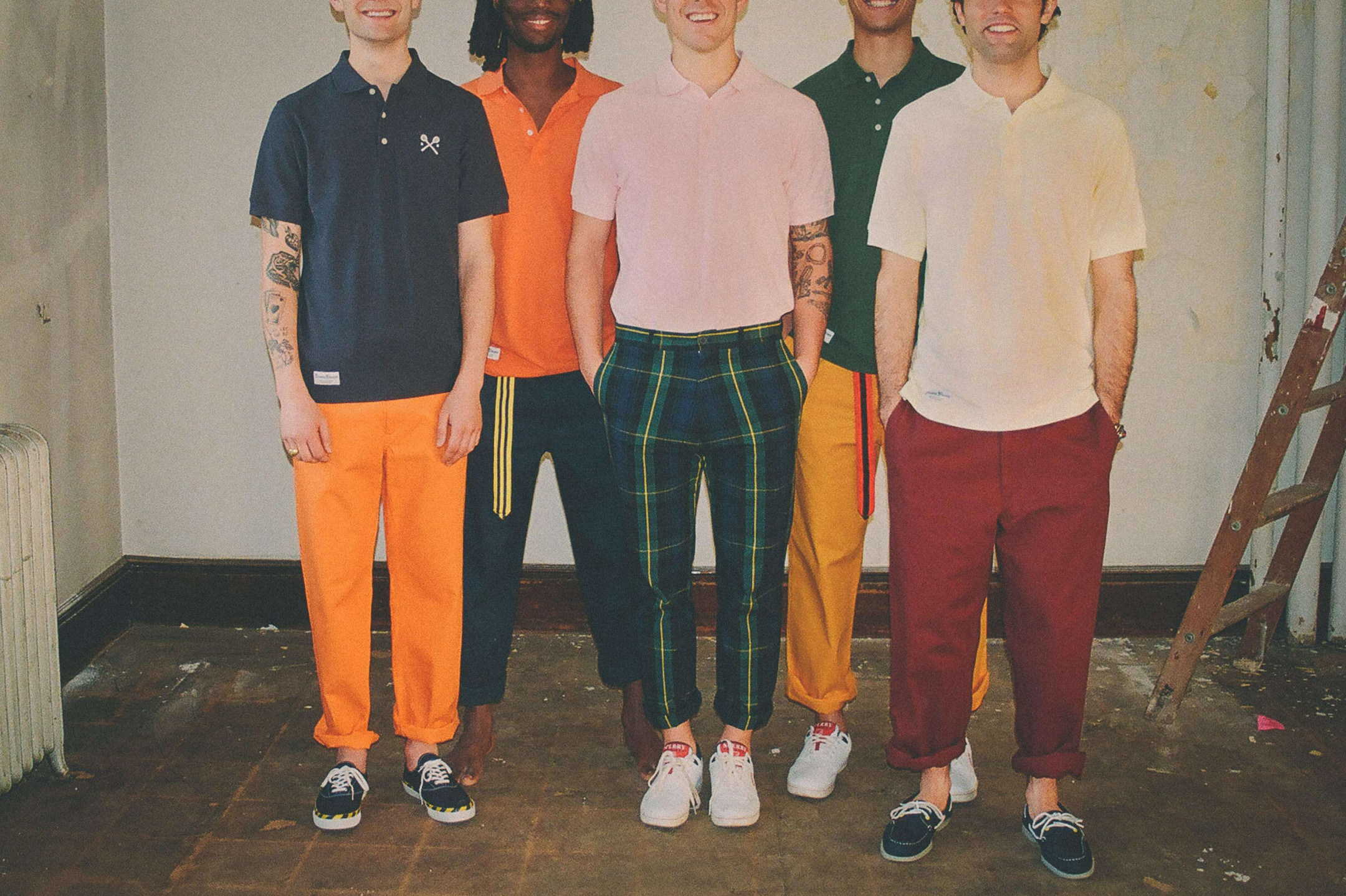 Male models in various Cotton Twill Trousers and Racquets Polos 