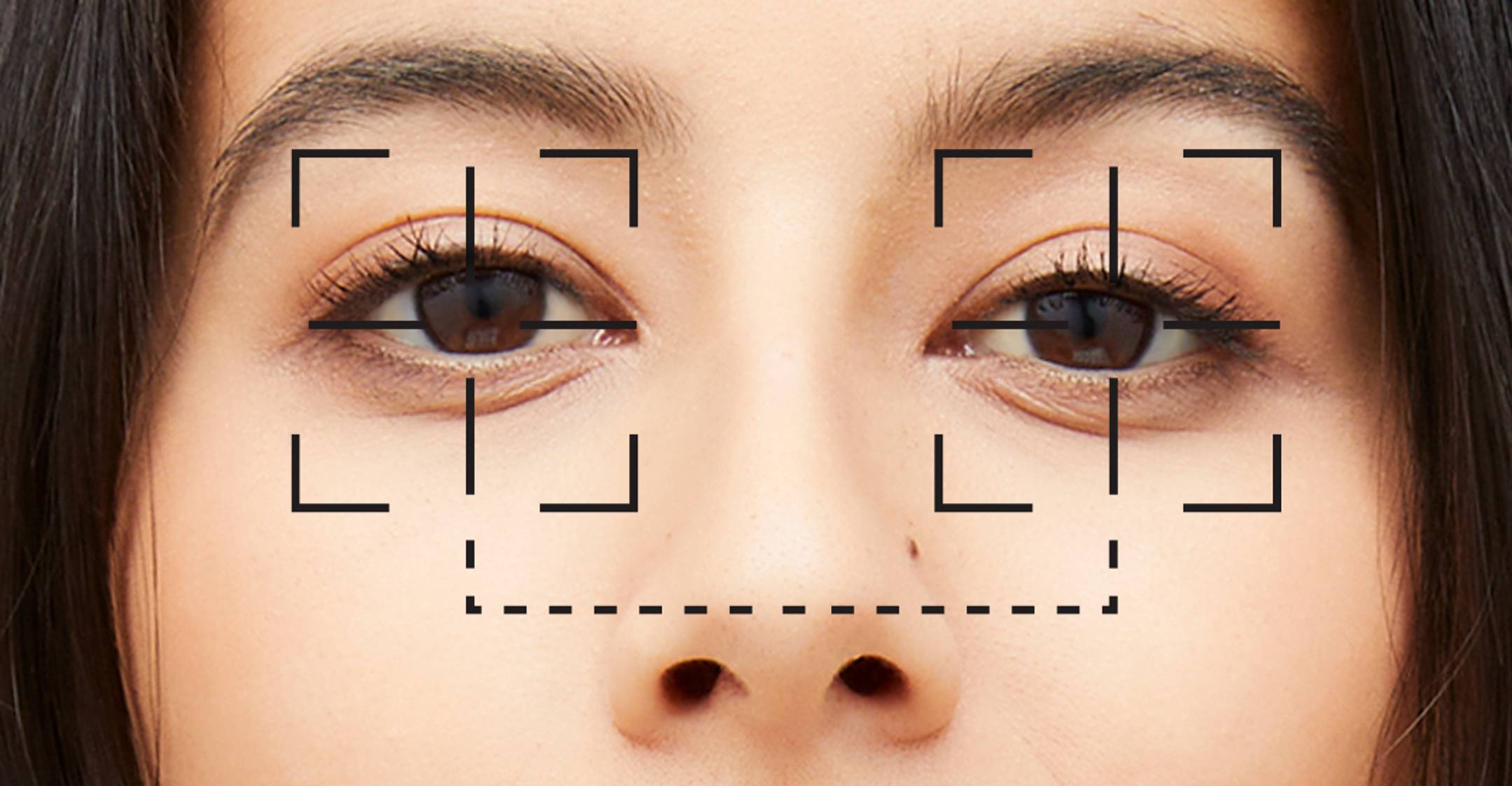 Female model with cross hairs over her eyes