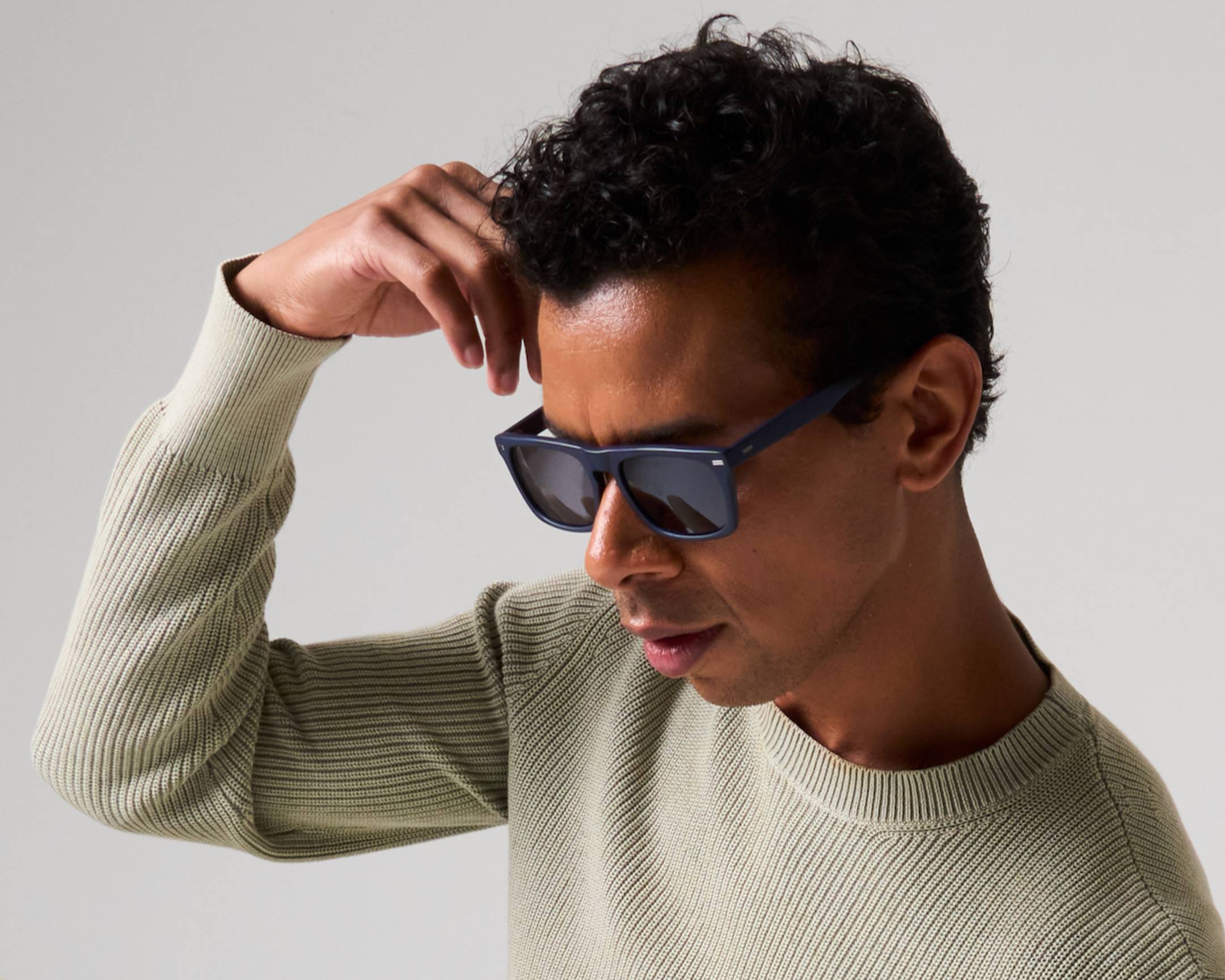Male model wearing Morgenthal Frederics sunglasses
