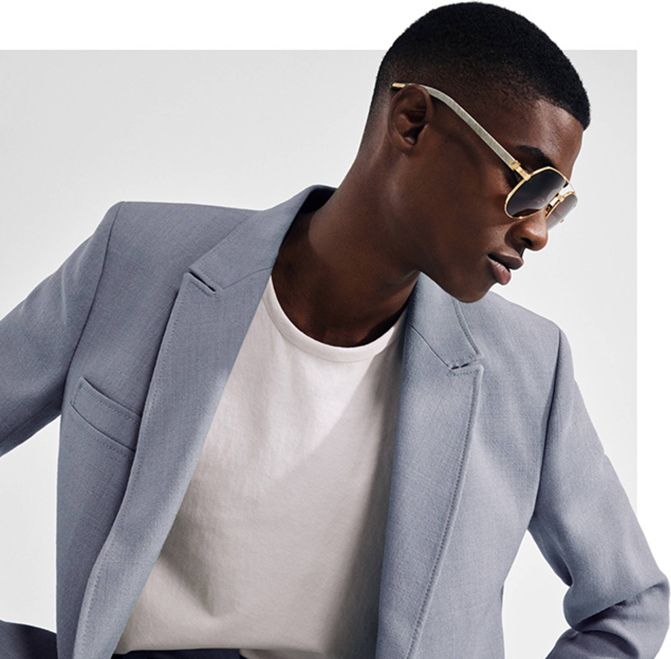 Male model wearing Cartier sunglasses