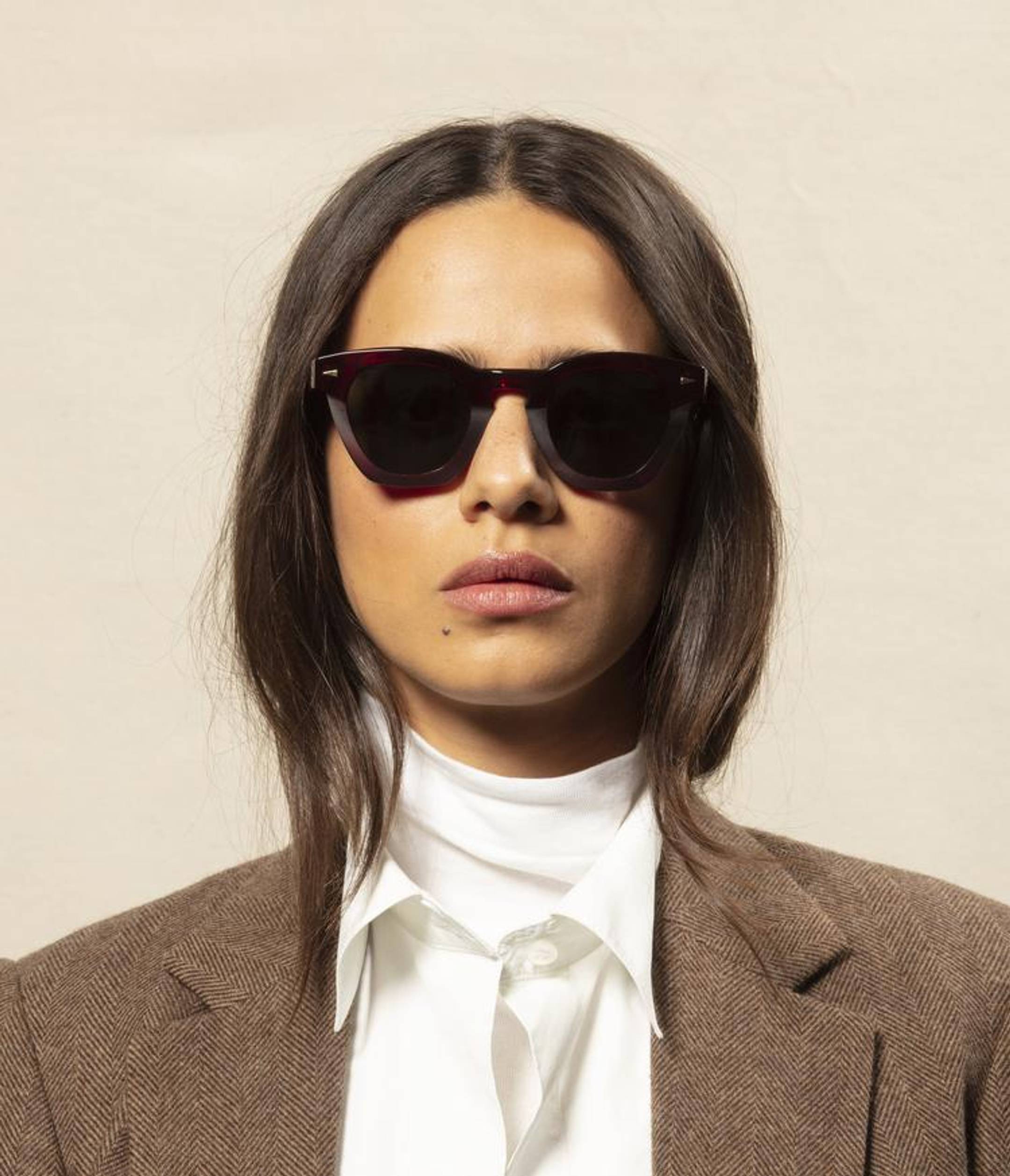 Female model wearing Ahlem sunglasses