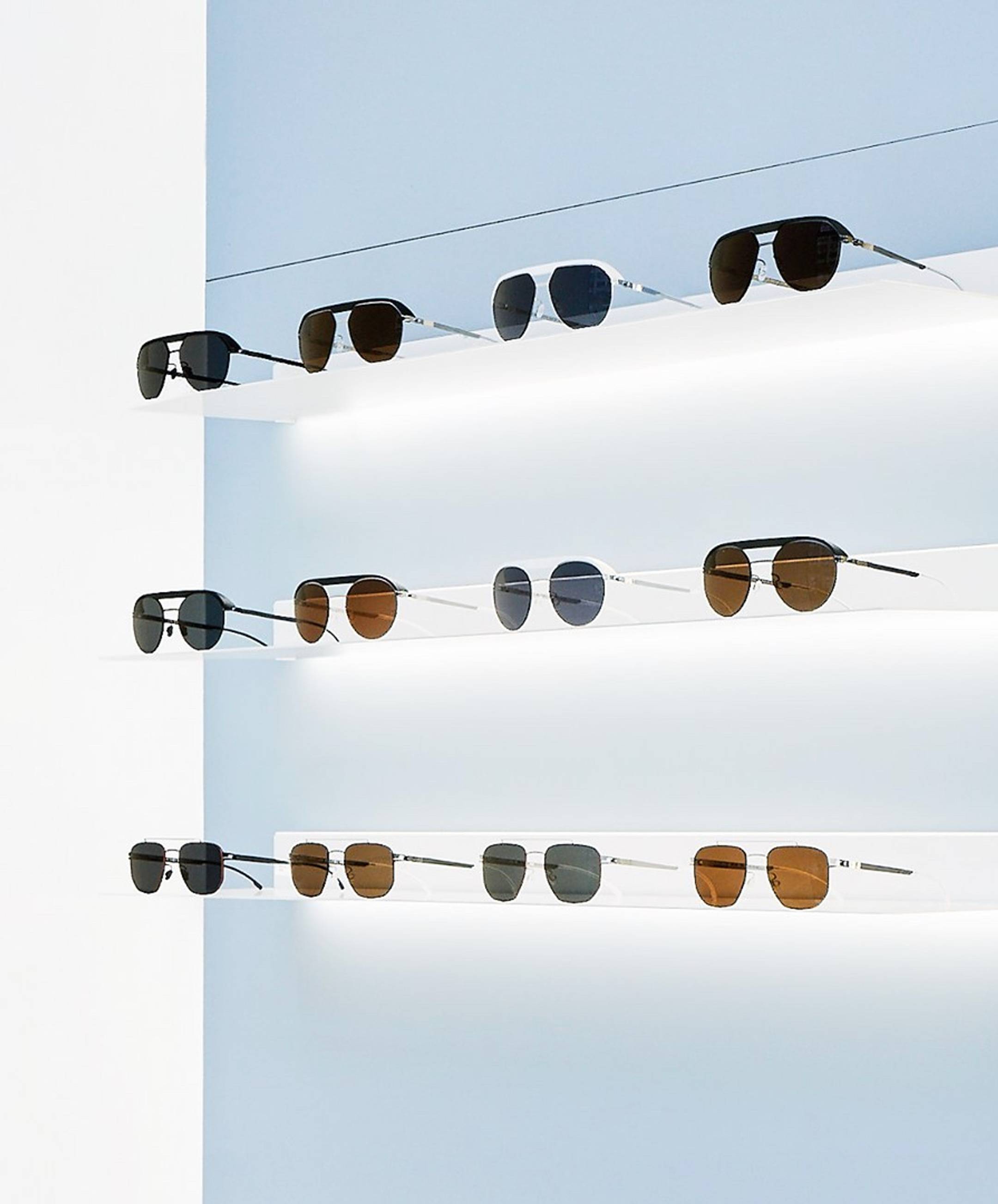 Shelf with multiple pairs of Mykita sunglasses