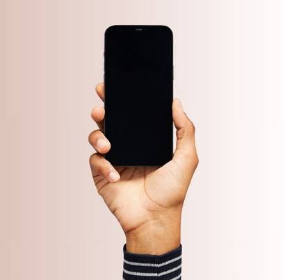 Hand model holding a phone against a beige gradient background